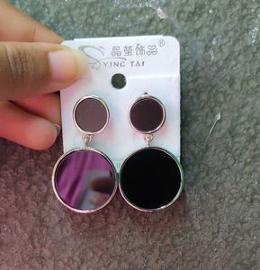 black earrings with silver body