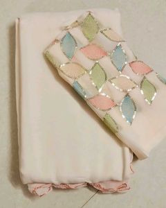 beautiful cream colour plan saree and designer blo