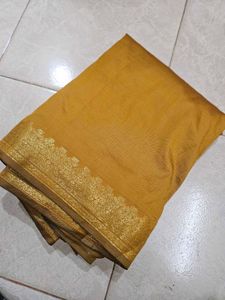 Elegant Mustard Saree with Gold Border
