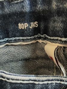 Distressed Dark Wash Denim Jeans