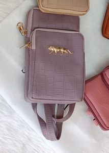 Mobile sling with two zips