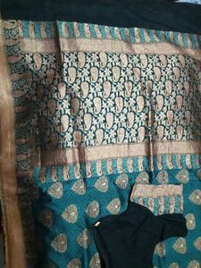 Embellished Banarasi Saree With Patterned Blouse.