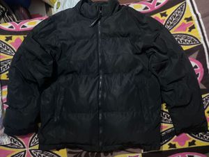black oversized puffer jacket