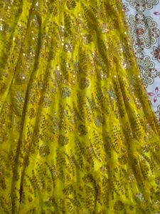 Yellow Embroidered Sequin Work Net Lehenga