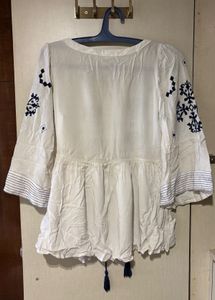 White Peplum Top
