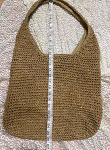 Woven straw shoulder bag