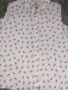 Floral Sleeveless Button-Down