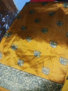 Ethnic Elephant pring yelloish orange saree...