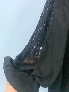 Elegant Black Top With Beautiful Sleeves