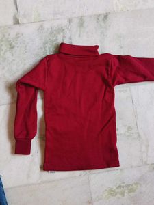 Highneck Woollen Tshirt And 3 Quarter Jeans.