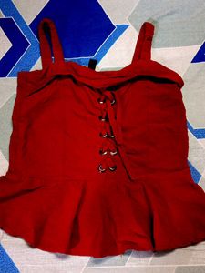 Sleeveless Beautiful Top In Maroon Colour