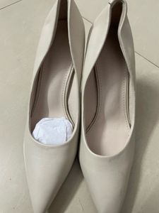 Ivory Pointed-Toe Heels