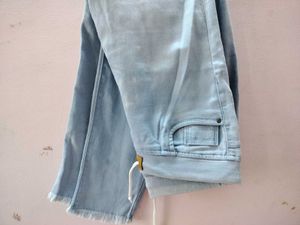 A High Rise Skinny Jeans