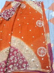 Orange embroidered saree