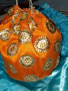 Potli Bag Wit Beautiful Golden Work