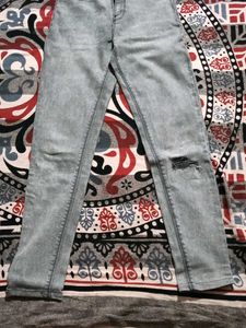 Ripped Knee Denim Jeans