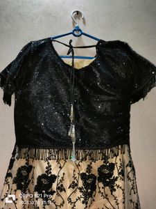 Black And Golden Lahenga With Heavy Work.