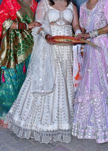 Heavy Lehnga With Backless Blouse And Dupatta.