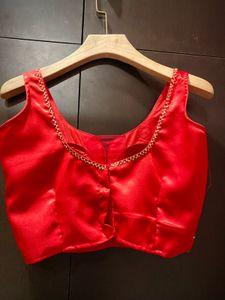 Red Satin Blouse with Intricate Beading