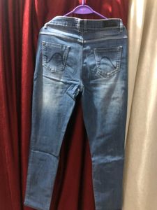 Slim Fit Distressed Denim.