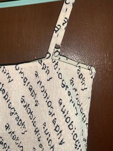 Trendy 'Autobiography' Print Top