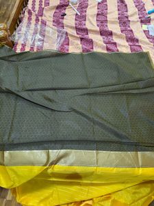 Elegant Yellow Art Silk Saree With A Classy Bangle