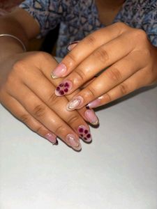 Burgundy Bow and Star Nails