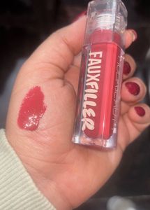 Huda Beauty FauxFiller lipgloss:- Bombshell