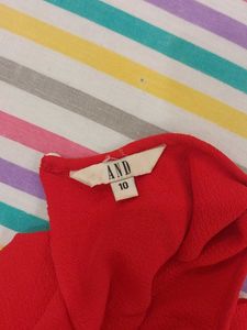 A Red Dress By The Brand AND
