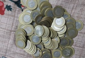 20 Rupees Coins 100 Pcs + 10 RupeesCoins 100pcs.