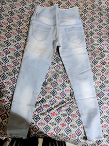 High-Waisted Distressed Jeans