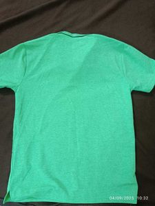 New unused medium Green Graphic Polo T-Shirt