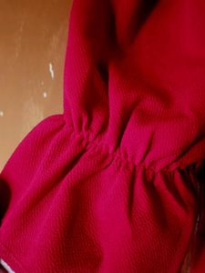Red dress with frilly sleeves
