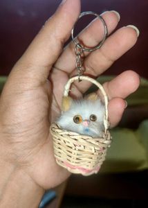 &#34;Fluffy Cat Keyring in Woven Basket&#34;