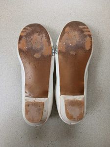 Elegant White Low-Heel Flats with Metallic Detail