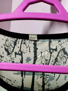 Patterned top with crystals