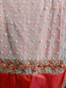 Embroidered silk net saree