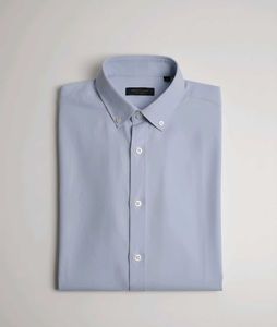 Long-sleeve polo shirt with a button-down collar.