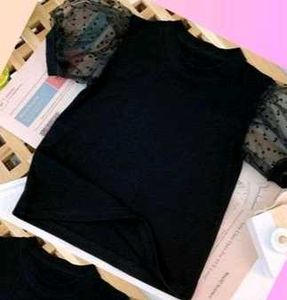 Black Top with Polka Dot Sleeves