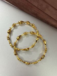 2.6 Gold Polish Set Of Two Bangles American Diamon
