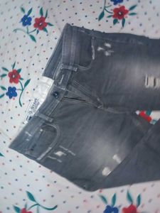 Distressed Gray Denim Jeans