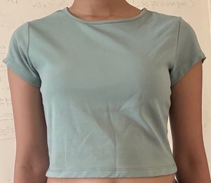 flattering sea green crop top