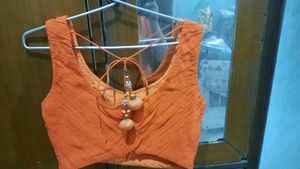 Orange Embellished Sleeveless Blouse