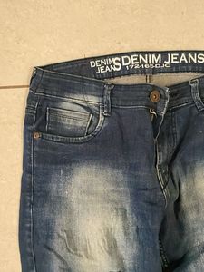 Distressed Denim Jeans