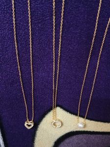 Graceful Gold Charm Necklace Trio