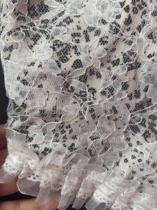 Delicate White Lace Cami with Pearl Buttons