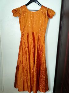 Elegant and traditional floor-length dress.
