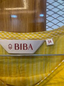 Yellow Embroidered Kurti