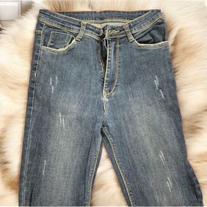Distressed Denim Jeans