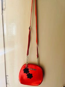 Women&#39;s Red sling bag